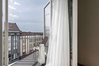Отель Radisson Blu Hotel, Klaipeda Клайпеда Улучшенный номер с балконом-1
